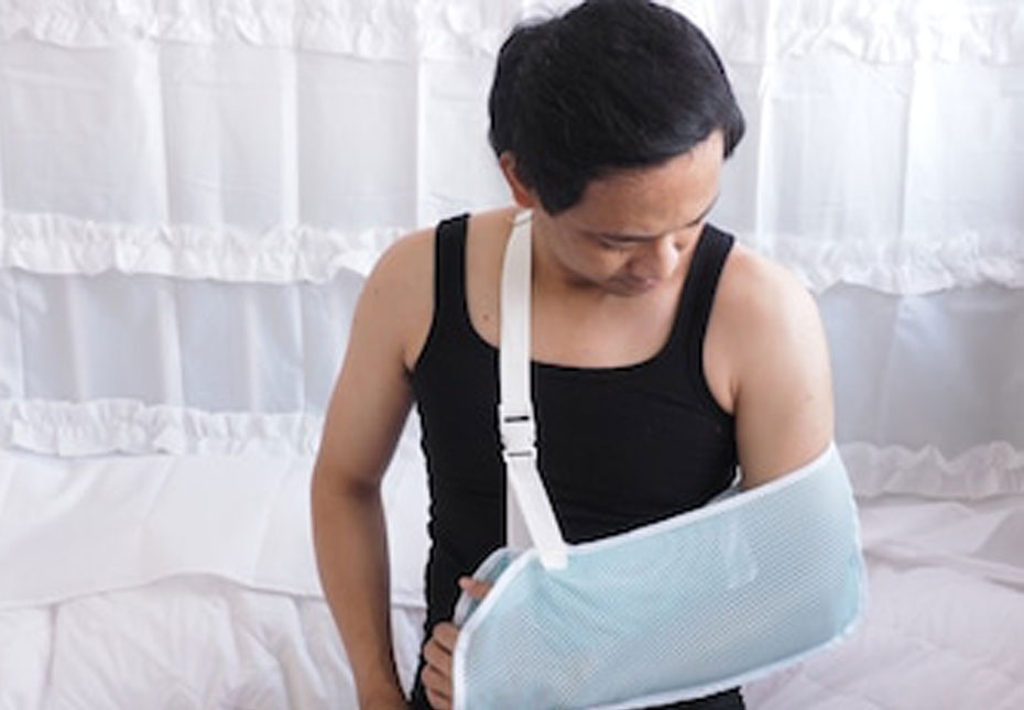 Patient with arm in sholder sling
