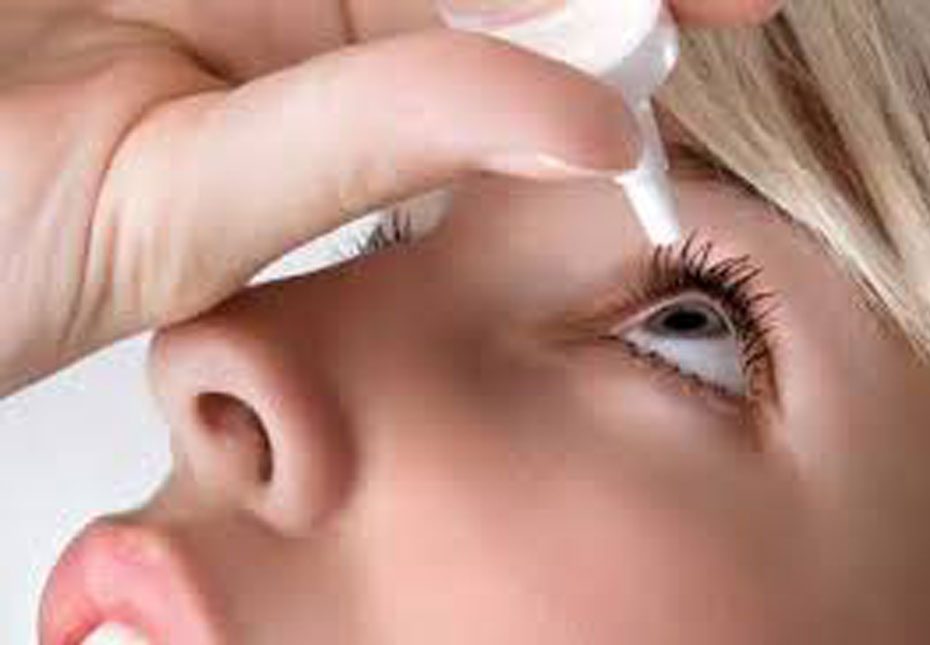 patient takimng eye drops